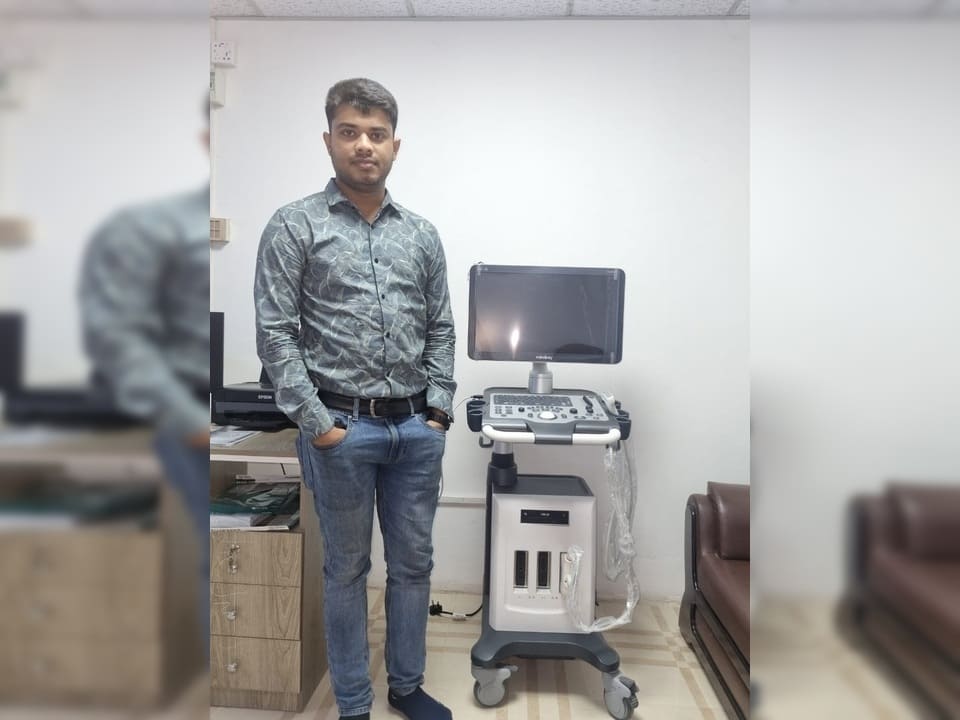 Engineer providing support for medical device